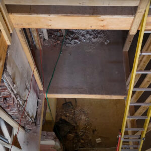 Featured image of filming of construction site inside an elevator shaft